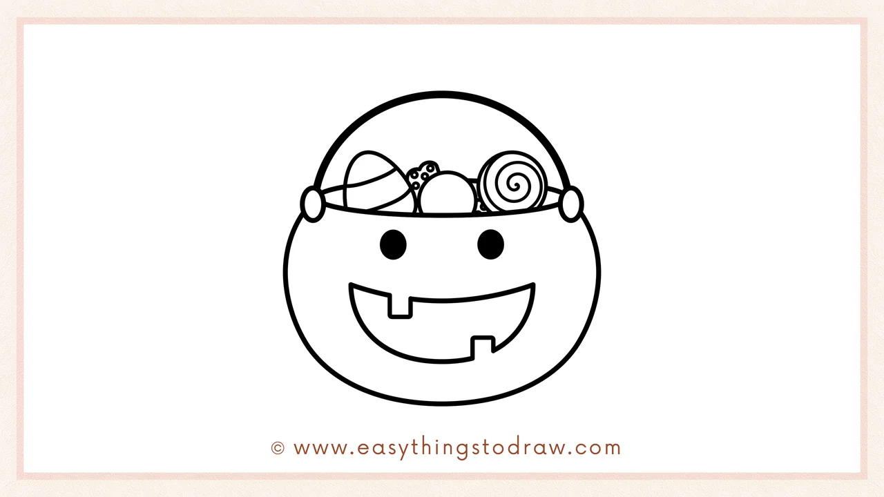 Step 3 of sketching a candy bucket for beginners – adding two round eyes and a big smiling jack-o'-lantern mouth.