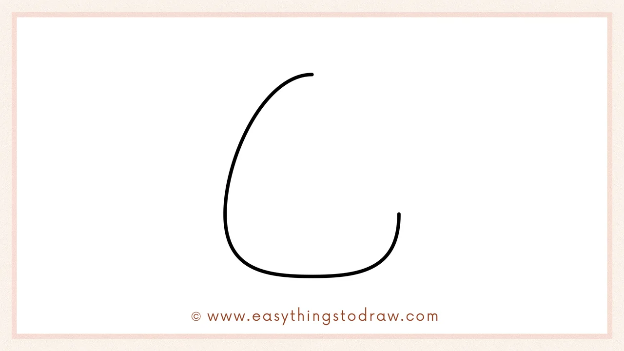 Step 2 of drawing a candy corn – adding a right curve and a 'U' shape at the bottom to form the candy corn body.