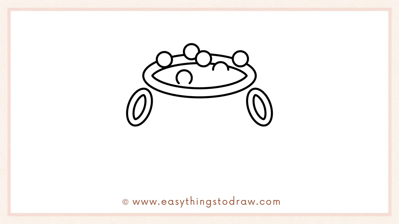 Step 4 of step-by-step cauldron sketch – Adding two oval rings on each side for handles, with smaller ovals inside for depth.