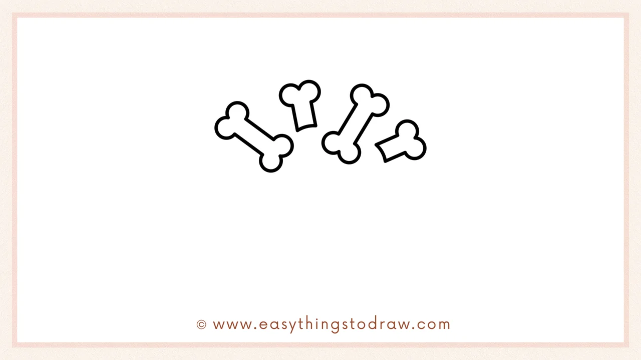 Step 2 of drawing a Halloween cupcake – Adding more bones scattered at different angles above the first set.