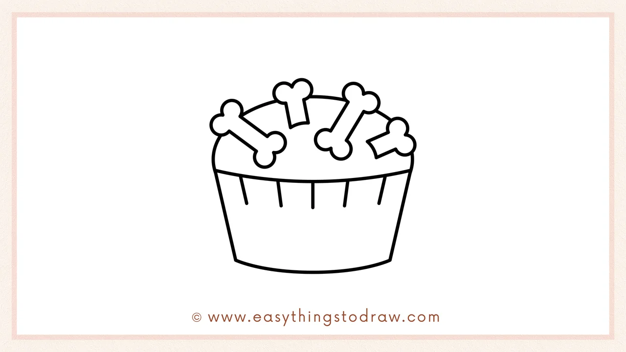 Step 5 of easy Halloween cupcake drawing steps – Adding vertical lines on the wrapper for texture.
