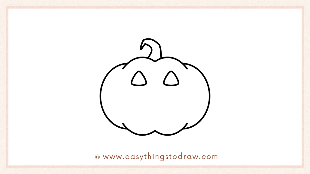 Step 5 of easy jack-o'-lantern drawing steps – Drawing two triangle shapes for the eyes.