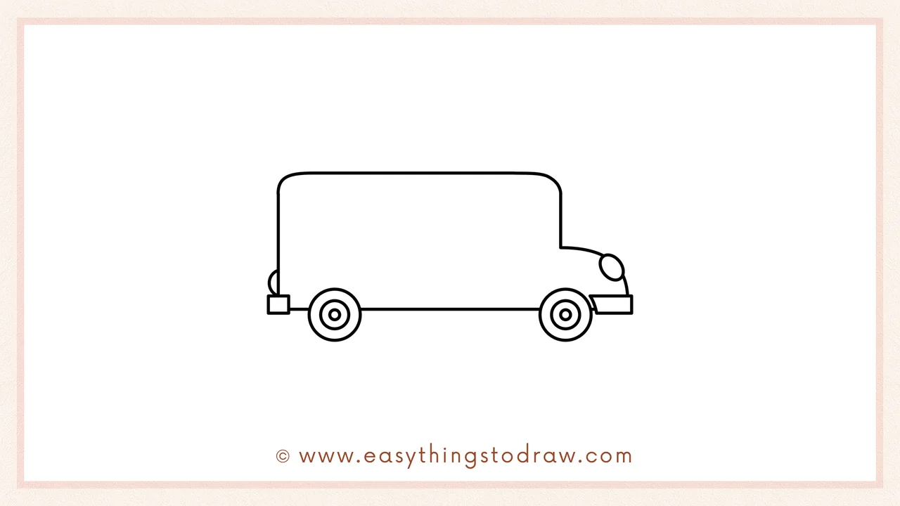 Step 2 of drawing a school bus – Adding two large circular wheels, a front bumper, and a round headlight.