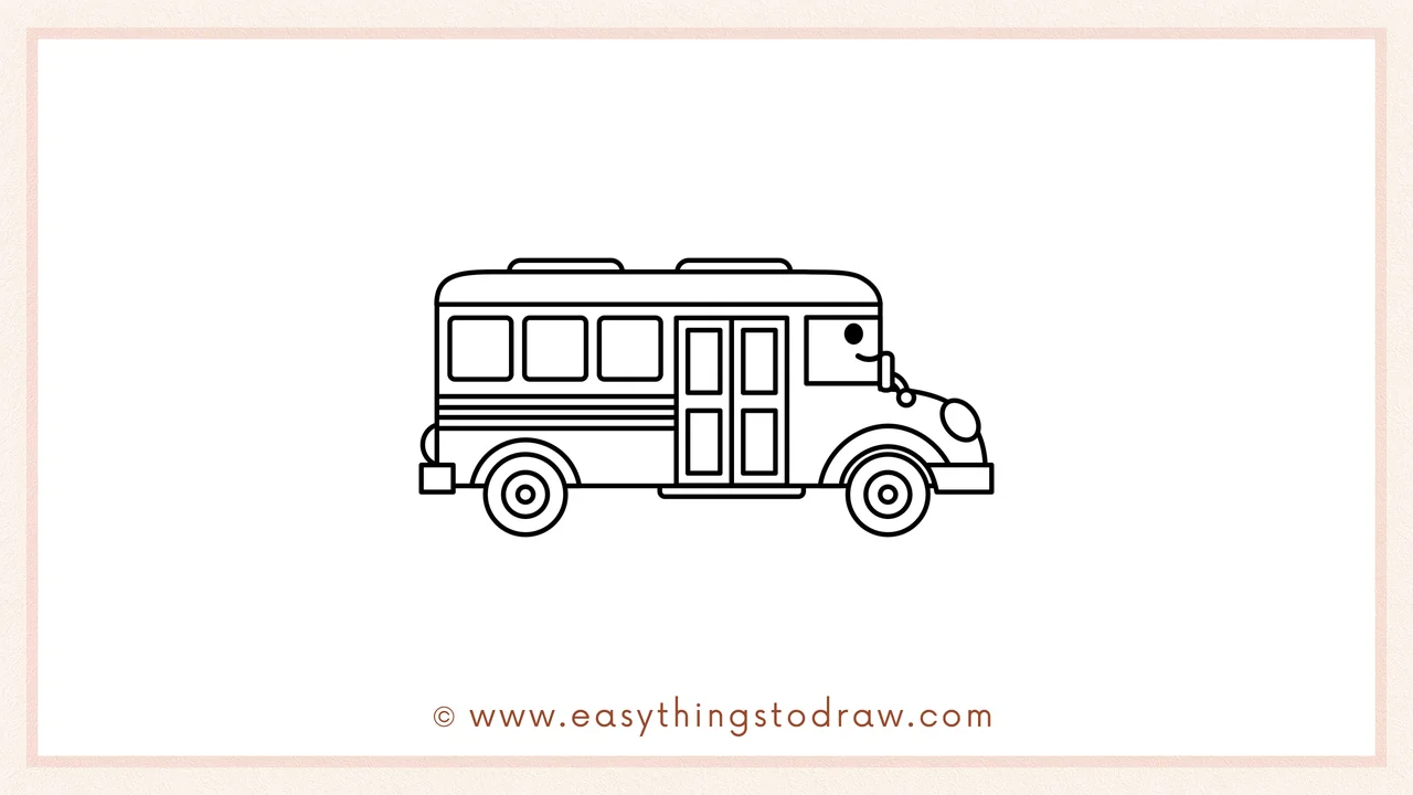 Step 6 of simple school bus drawing tutorial – Giving the bus a smiling face on the front window and adding a side mirror.