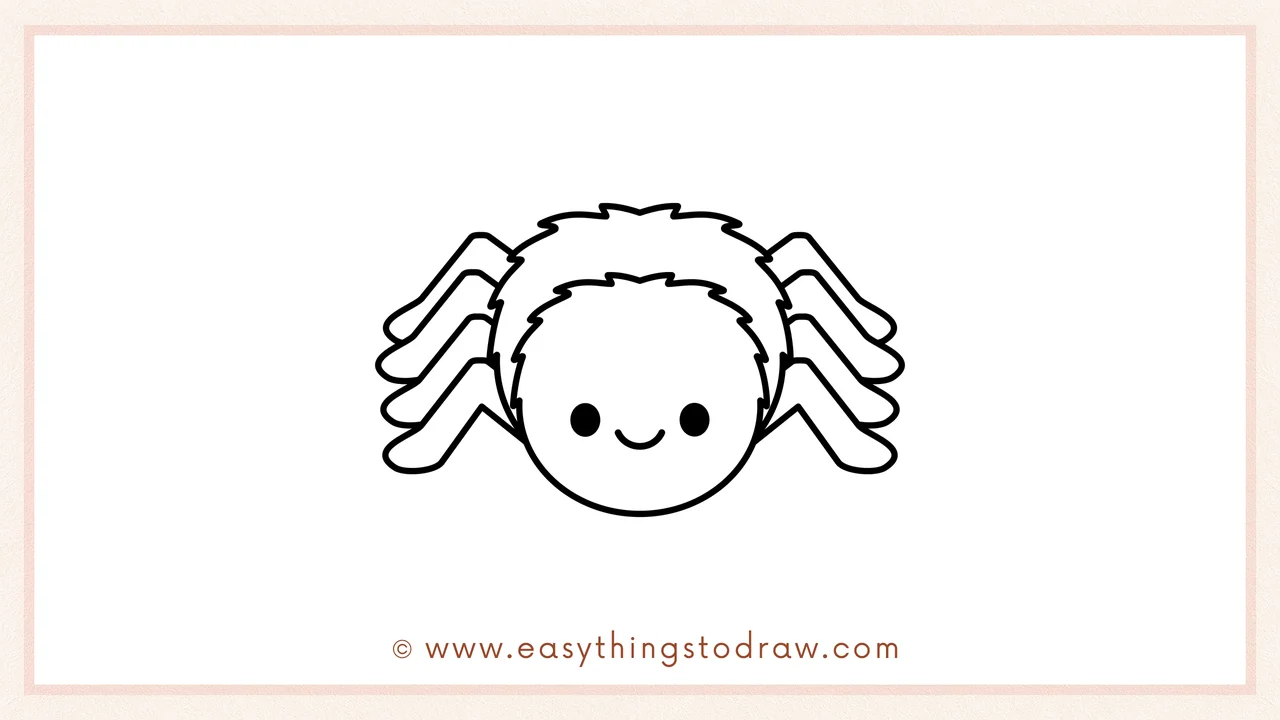 Step 6 of simple spider drawing tutorial – drawing two eyes and a smiling mouth for a friendly spider face.