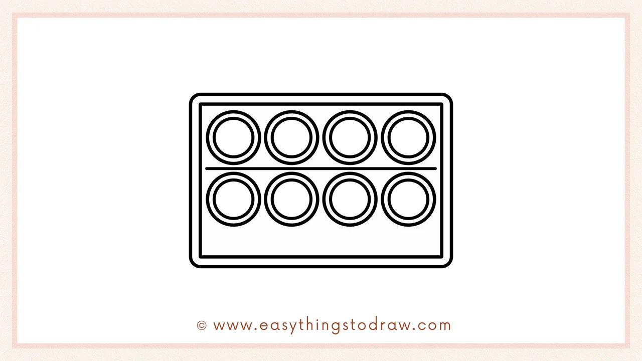 Step 5 of easy watercolor palette drawing steps – Adding five circles below the center line for the bottom paint row.