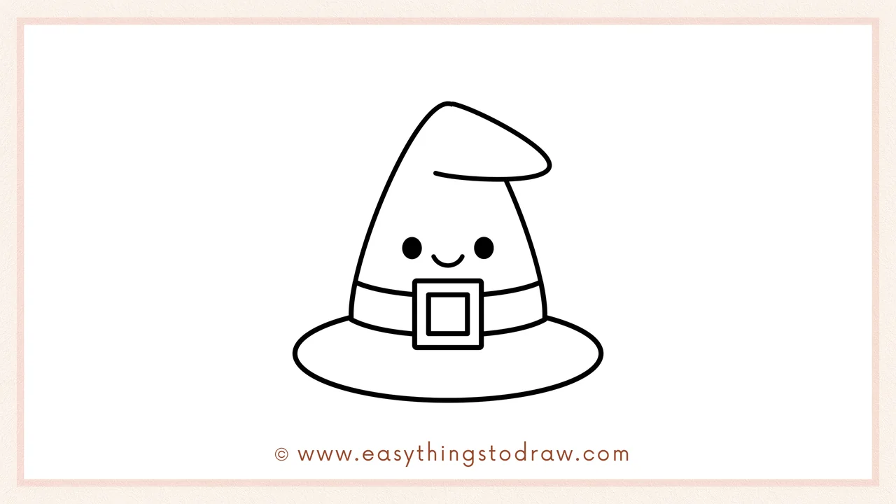 Step 6 of simple witch hat drawing tutorial – Adding two black eyes and a small smiling mouth under the band for a cute face.