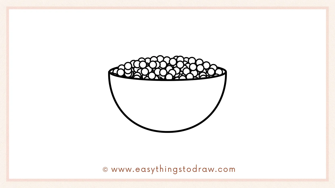 Step 5 of easy bowl of Thanksgiving peas drawing steps – Adding black semicircles and darker areas among peas to create depth.