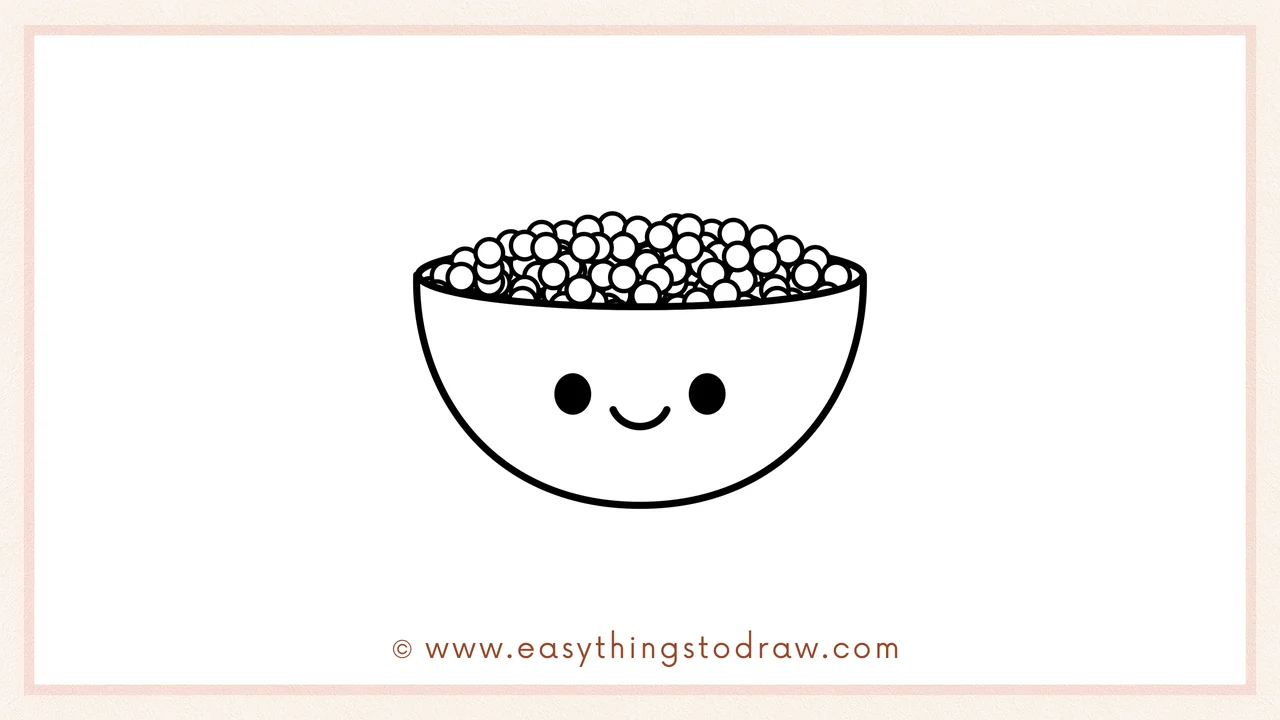 Step 6 of simple bowl of Thanksgiving peas drawing tutorial – Drawing two big black eyes and a smiling mouth on the bowl.