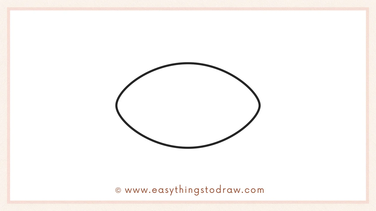 Step 1 of how to draw a football – Drawing a pointed oval or eye shape for the football base.