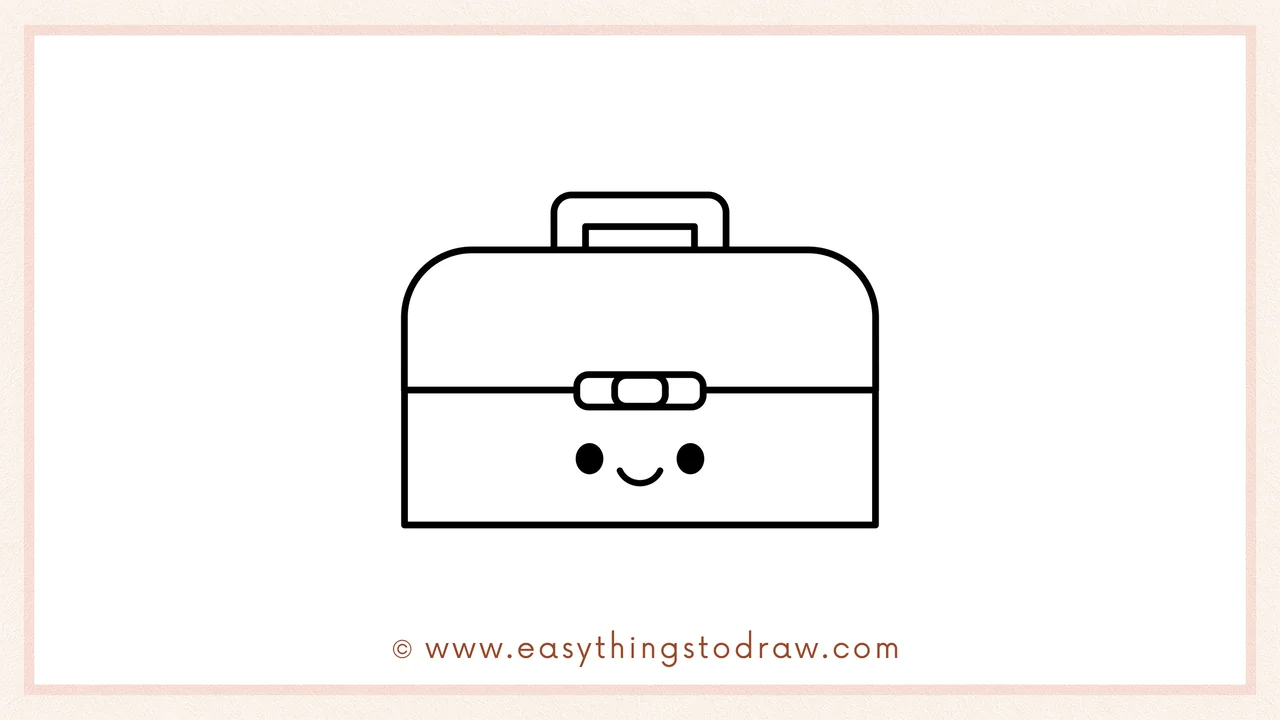 Step 6 of simple lunch box drawing tutorial – Adding two dot eyes and a smile to give the lunch box a happy face.
