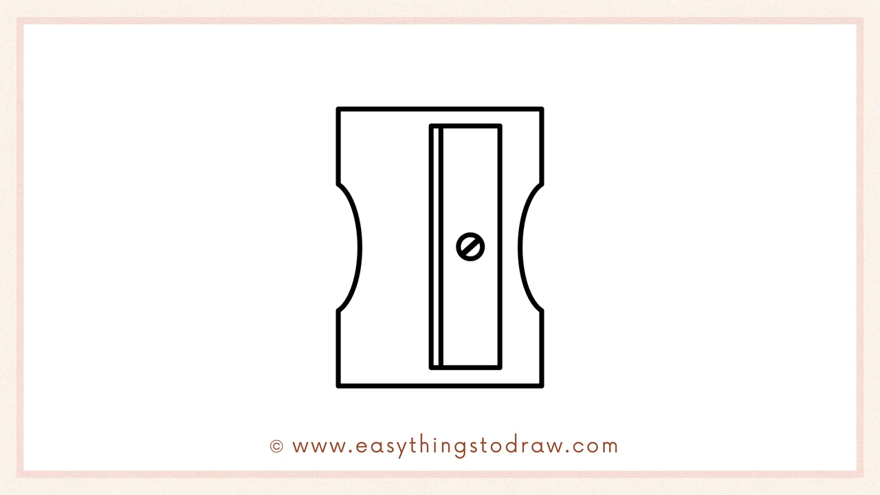 Step 5 of easy pencil sharpener drawing steps – drawing a small circle with a slash inside for the blade's retaining screw.