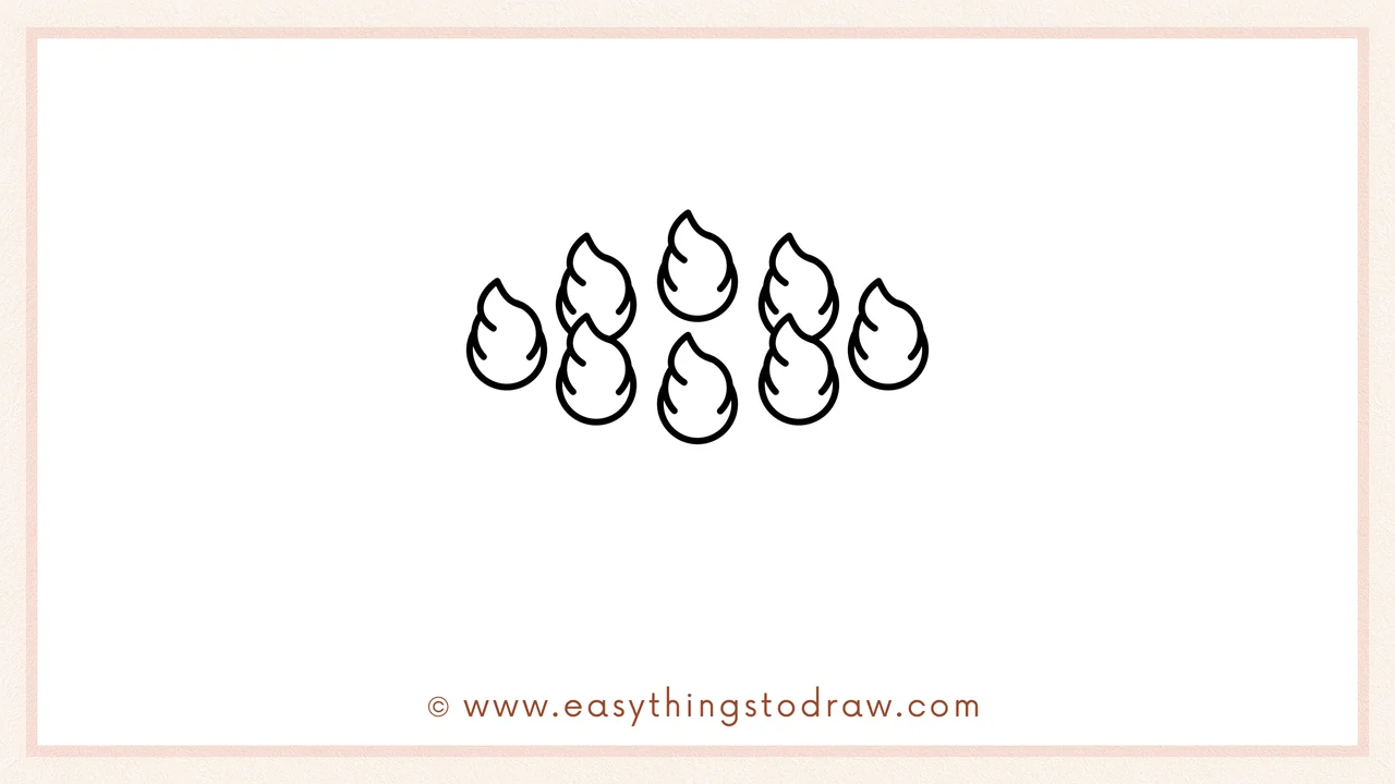 Step 2 of drawing a pumpkin pie – Adding four more whipped cream swirls behind the first row for a full look.