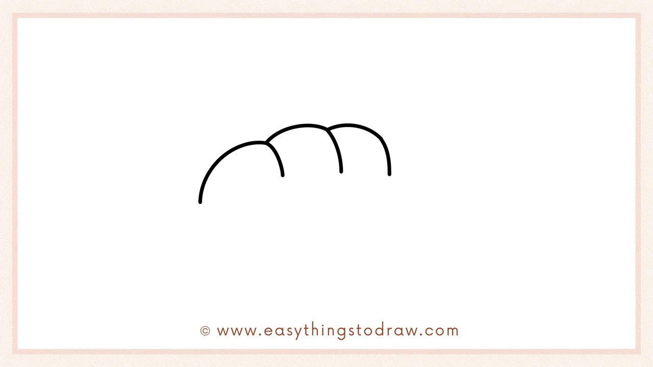 Step 3 of sketching a Thanksgiving bread for beginners – Continuing by adding a third curved bump to the right.
