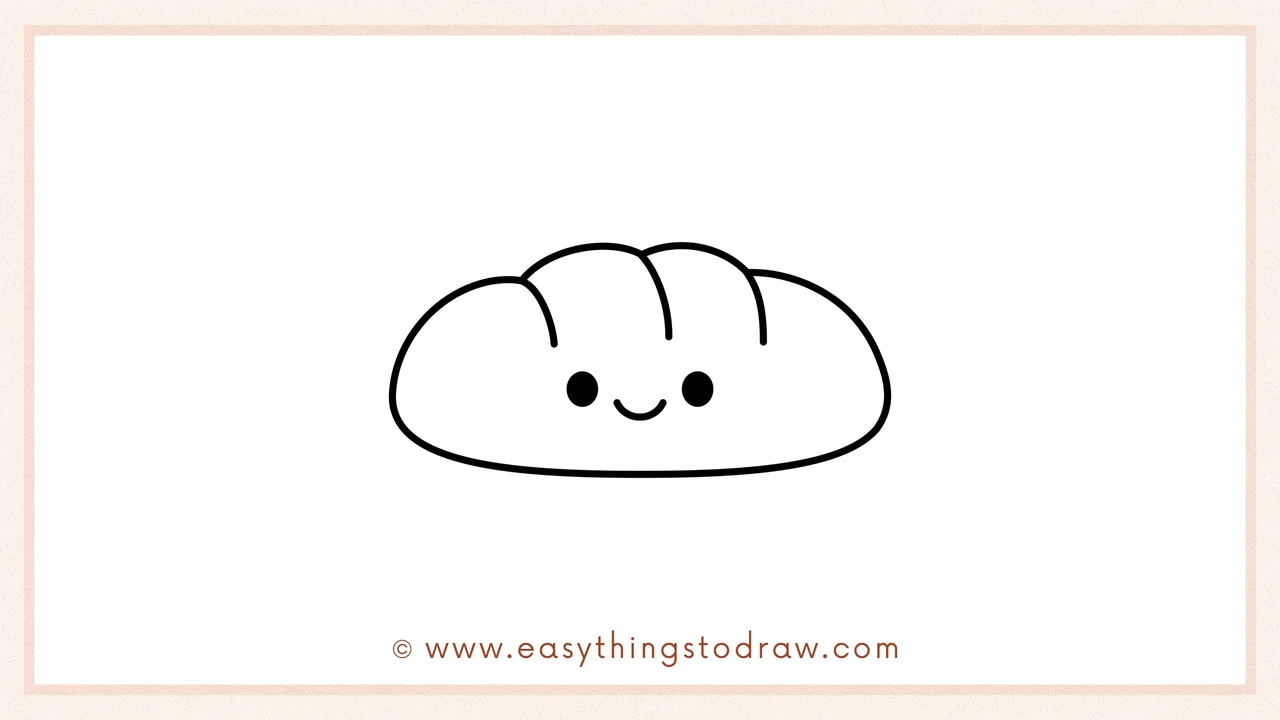 Step 6 of simple Thanksgiving bread drawing tutorial – Adding two round eyes and a smiling mouth to the Thanksgiving bread.
