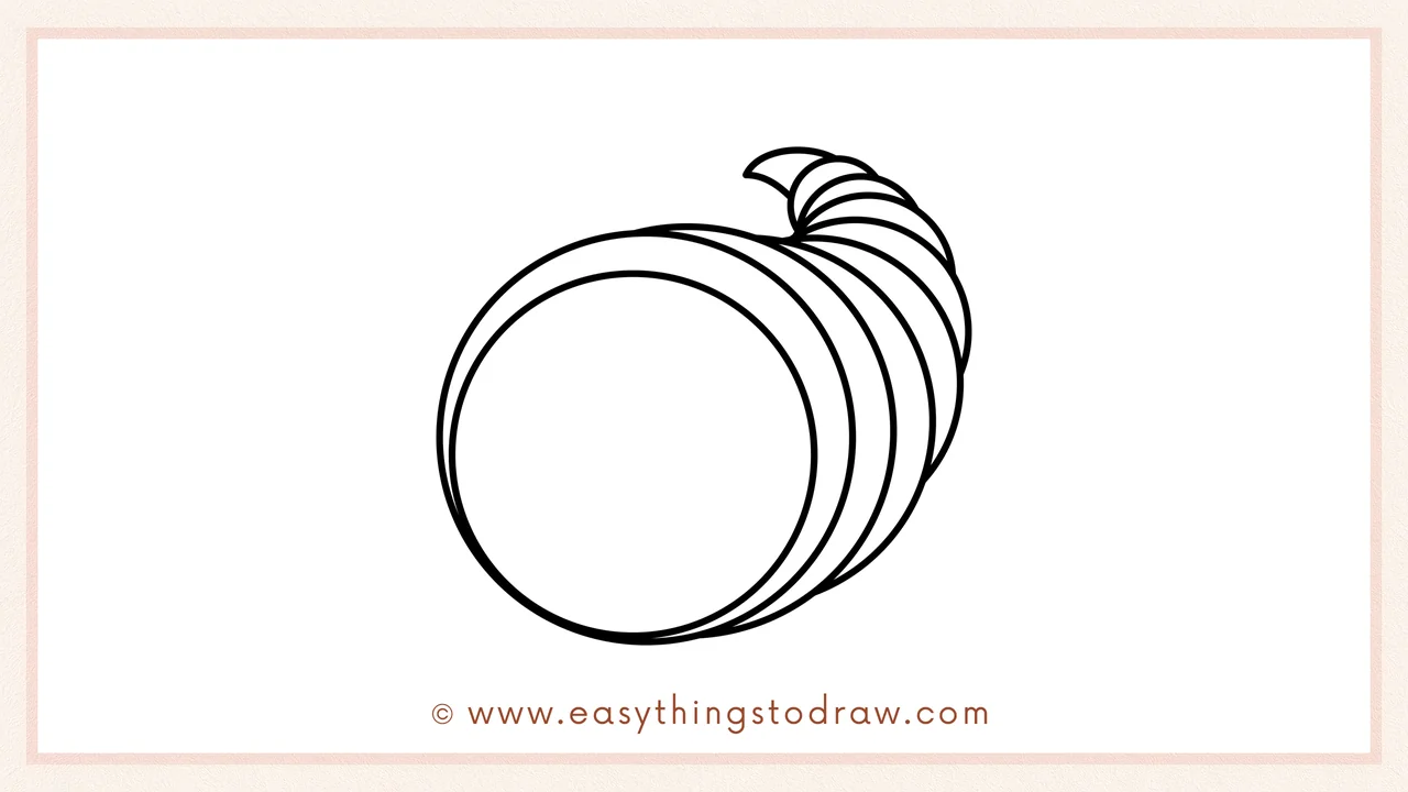 Step 2 of drawing a Thanksgiving Cornucopia – Adding curved spiral rings to form the cornucopia horn shape.