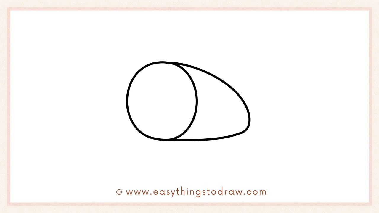 Step 2 of drawing a Thanksgiving ham – Add an oval on the left side for the cut face of the ham, overlapping the rounded end.