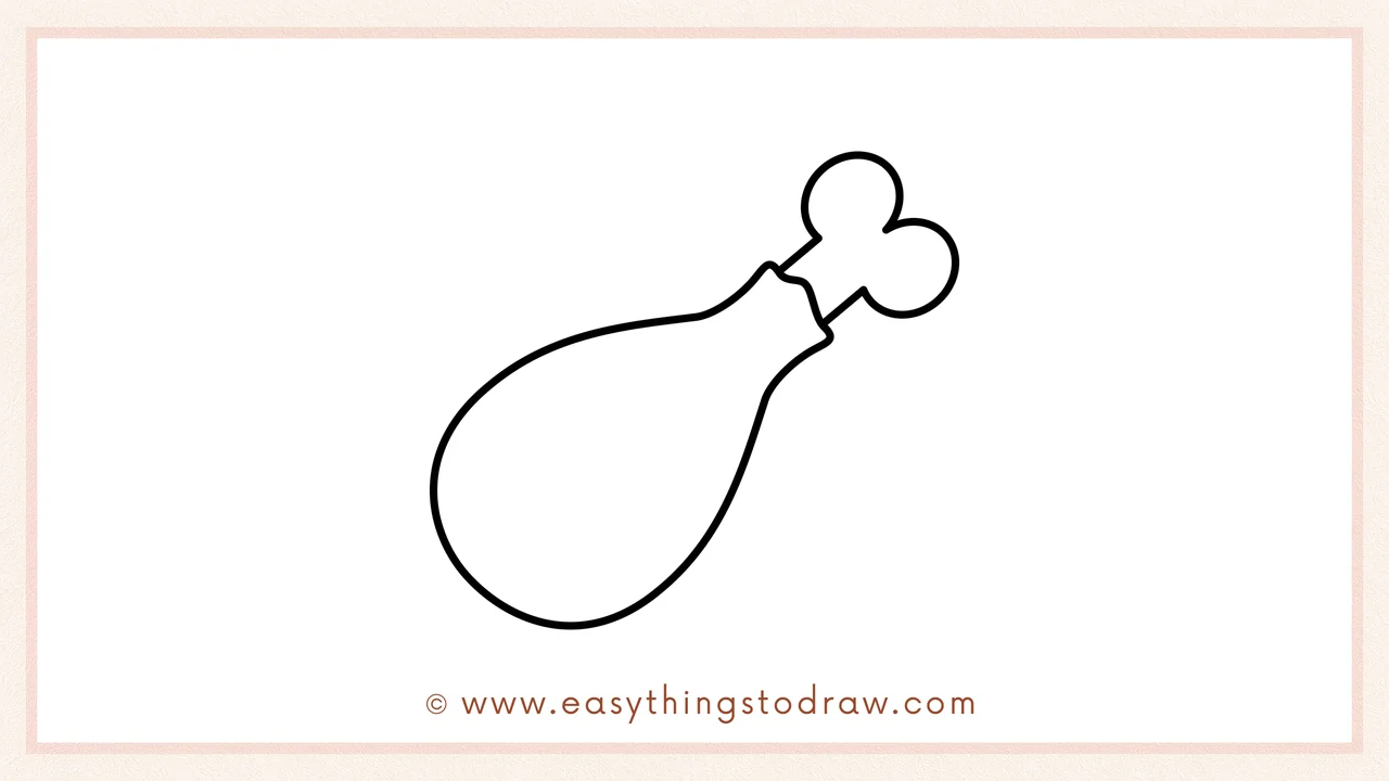 Step 5 of easy turkey leg drawing steps – drawing a second circle next to the first to complete the bone handle.
