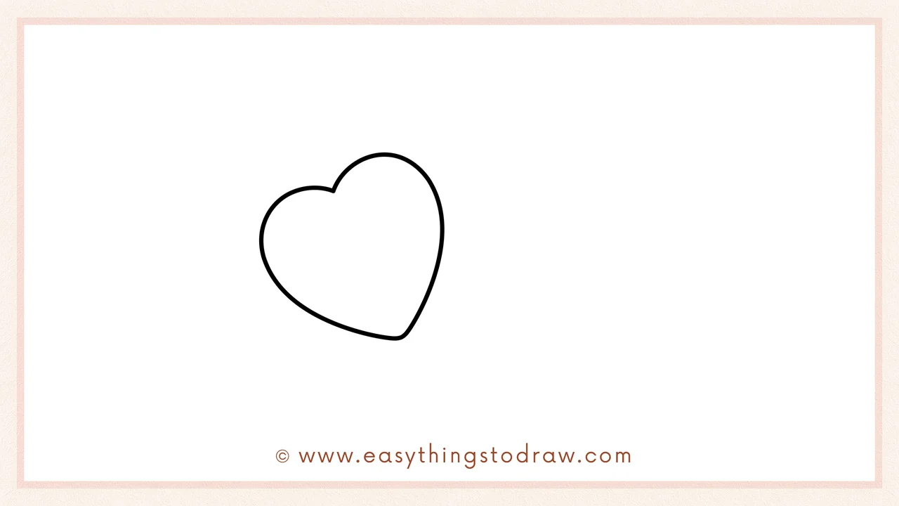 Step 1 of how to draw a candy heart – Start by drawing a tilted heart shape on the left side of the page.