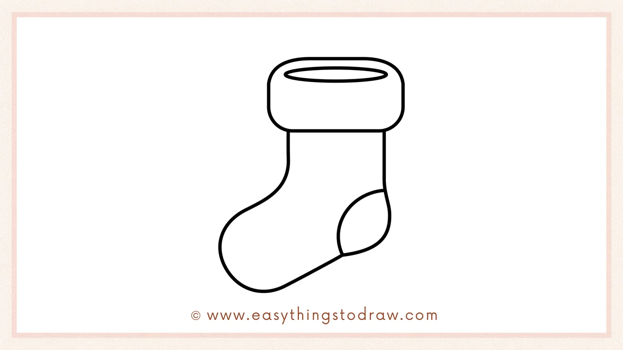Step 4 of a step-by-step Christmas stocking sketch – adding a rounded shape on the curve for the heel patch.