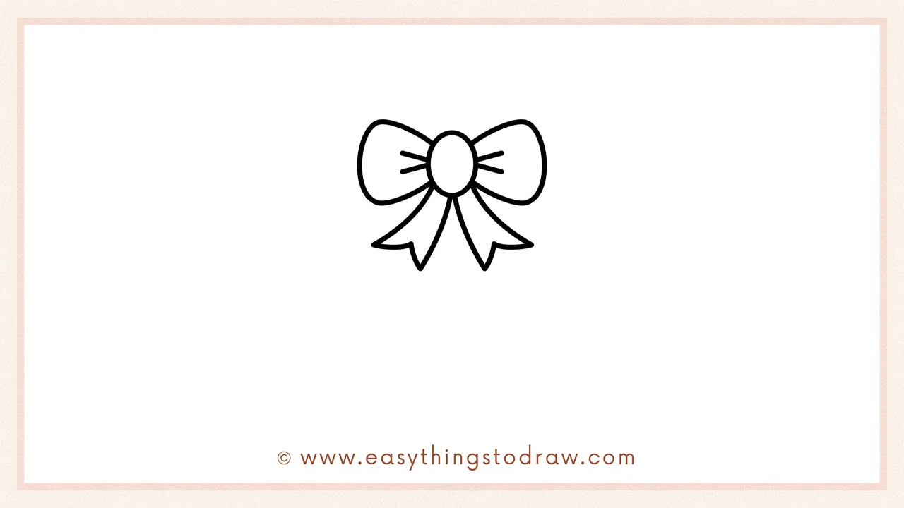Step 2 of drawing a christmas wreath – Adding two pointed ribbon tails hanging down from the bottom of the central bow.