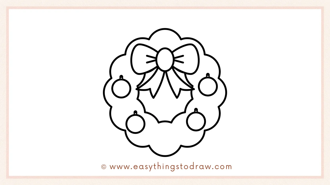 Step 5 of easy christmas wreath drawing steps – Drawing two more round ornaments near the bottom for a balanced design.