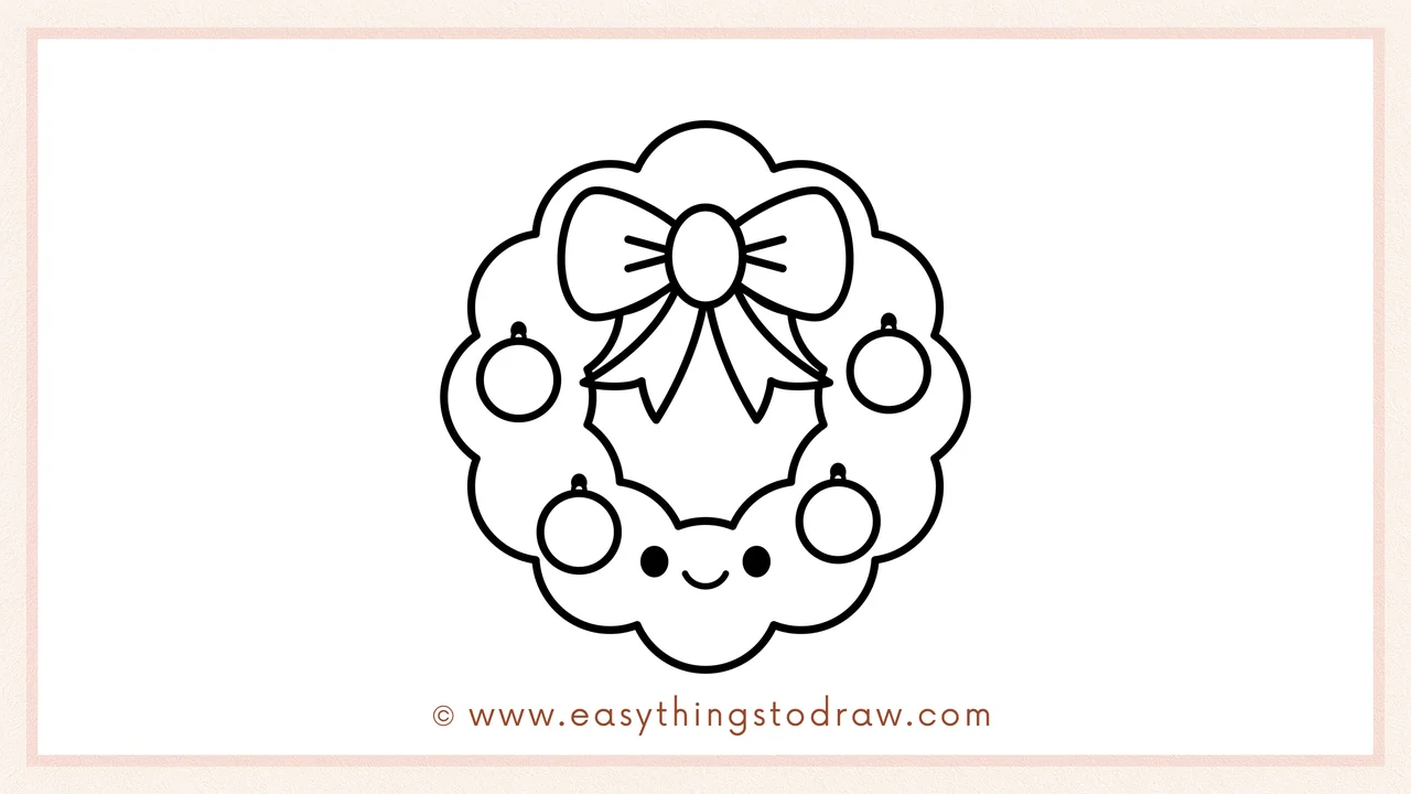 Step 6 of a simple christmas wreath drawing tutorial – Adding two dot eyes and a cute smiling mouth to give it a personality.