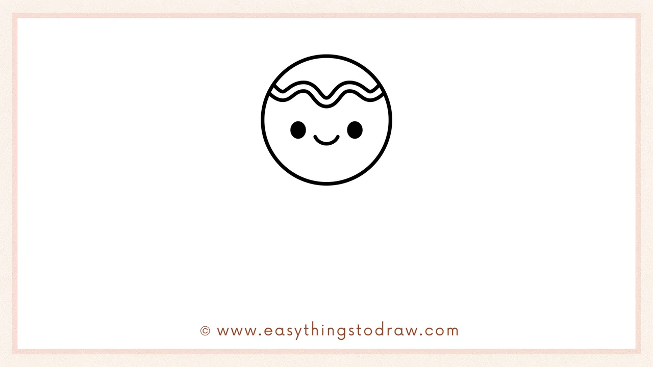 Step 2 of drawing a gingerbread man – Adding two circle eyes, a smile, and a wavy icing line on the head.