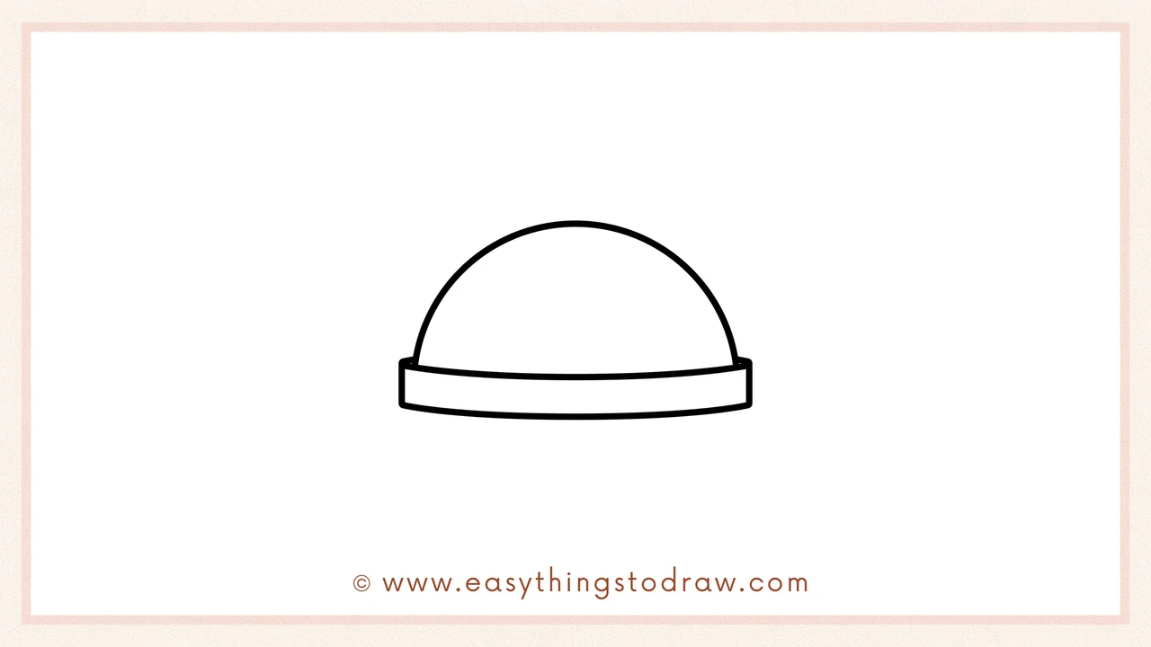 Step 2 of drawing a jingle bell – sketching a large half-circle shape on top of the band for the dome.