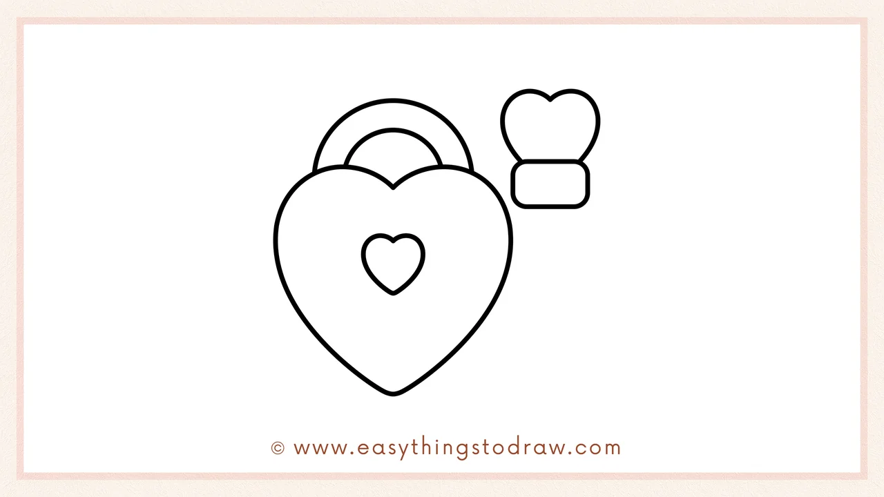 Step 4 of a step-by-step lock and key sketch – Drawing a small heart on top of a rectangle to form the key's head.