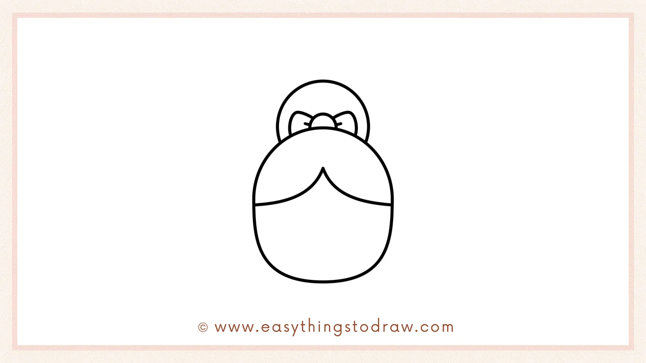 Step 3 of sketching a Mrs. Claus for beginners – Drawing a simple bow with two loops inside the hair bun.
