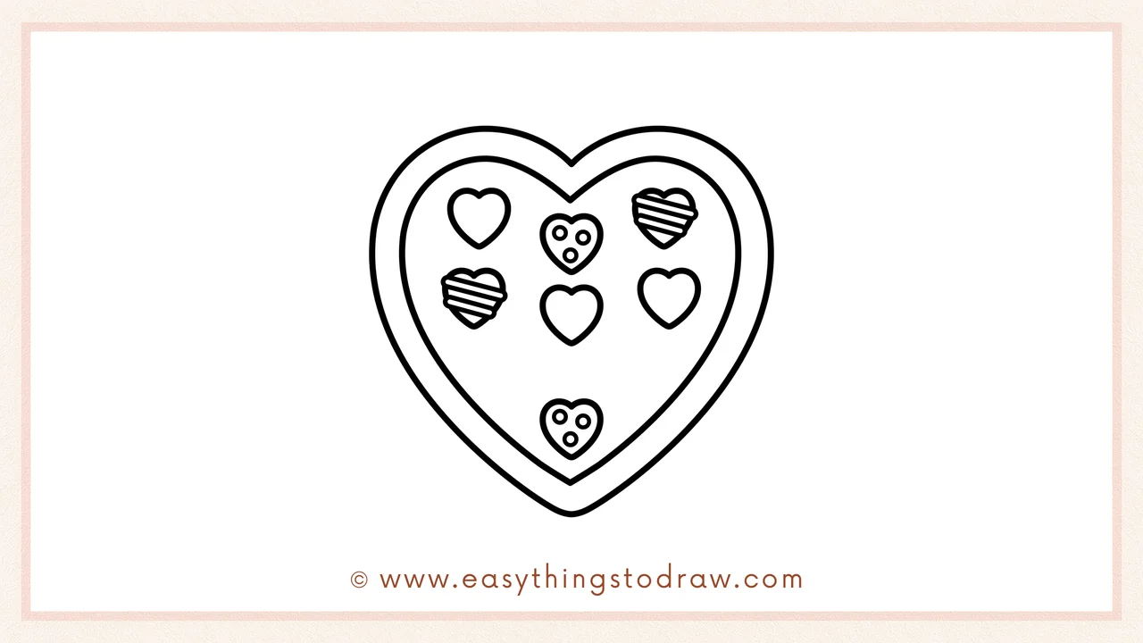 Step 5 of easy Valentine's Day box of chocolates drawing steps – Drawing one final chocolate at the bottom tip of the heart.