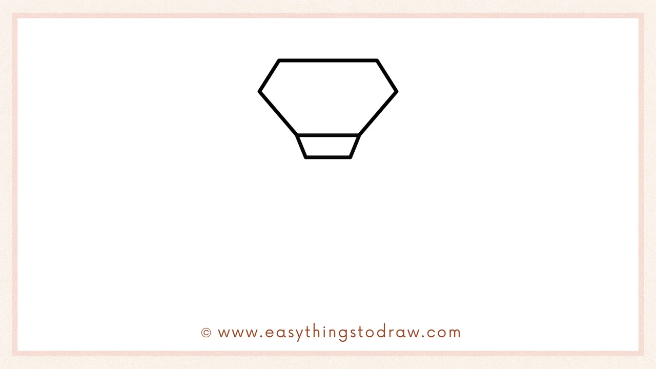 Step 2 of drawing a Valentine's Day Ring – A wide hexagon is added on top of the trapezoid to complete the gem shape.