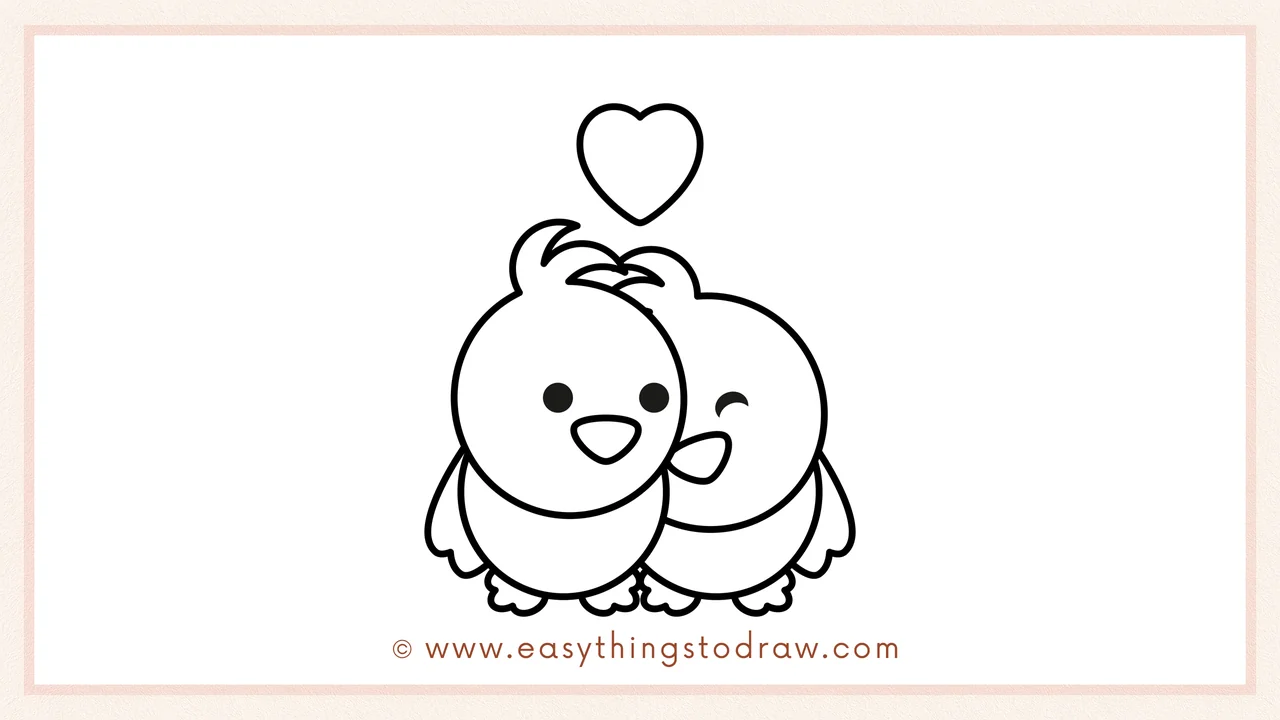 Step 6 of simple love birds drawing tutorial – drawing a simple heart shape above the two birds to symbolize their love.