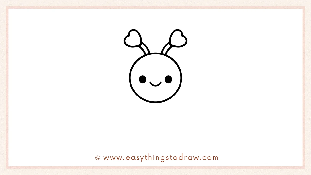 Step 2 of drawing a love bug – Two curved lines with small hearts on top are added to the head for antennas.