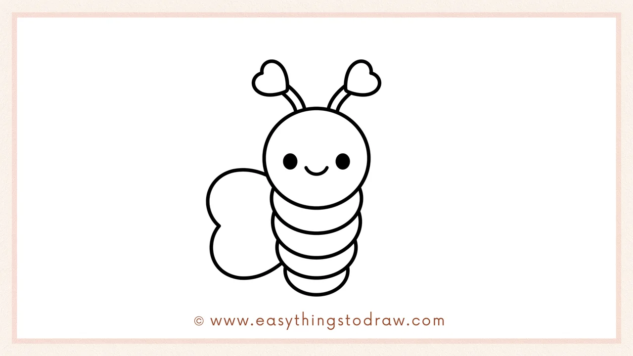 Step 4 of a step-by-step love bug sketch – A large heart shape is added to the left side of the body for a wing.