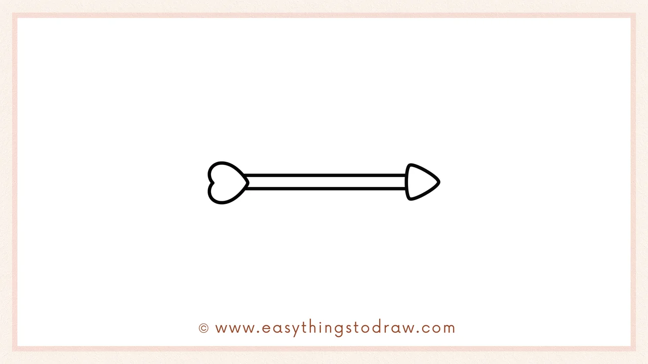 Step 3 of sketching a valentines bow and arrow for beginners – Drawing a rounded triangle shape at the end of the shaft for the arrowhead.