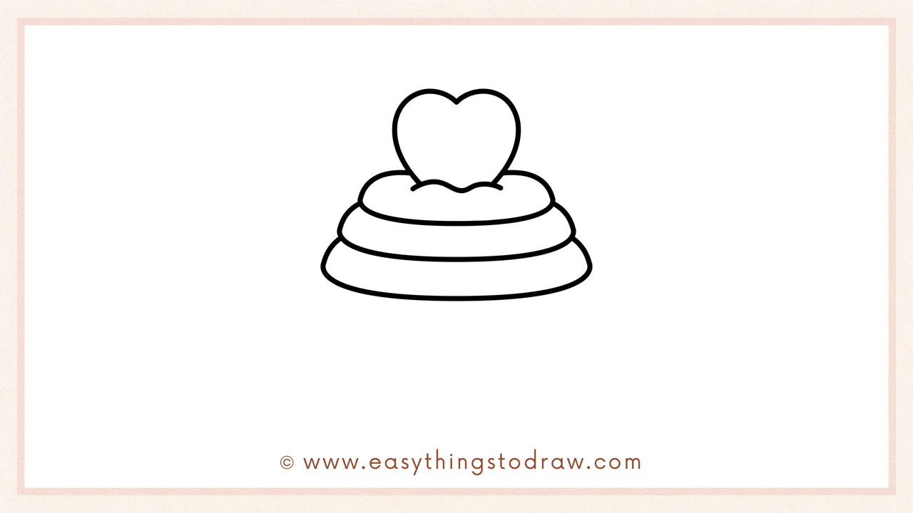 Step 4 of a step-by-step valentines cupcake sketch – Drawing the final, widest layer of frosting at the bottom of the stack.