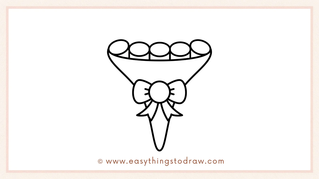 Step 3 of sketching a Valentine’s Day bouquet for beginners – drawing a row of circles at the top of the wrapping paper.