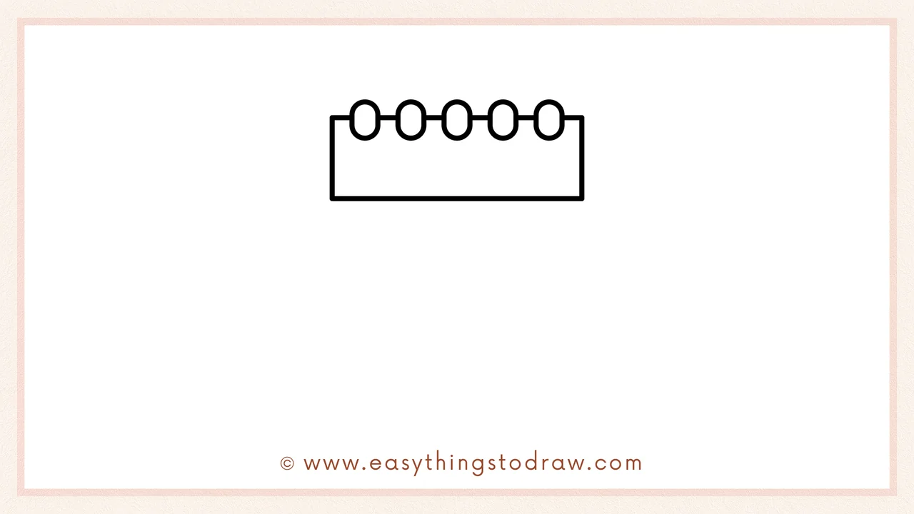 Step 2 of drawing a valentines day calendar – Adding a long horizontal rectangle below the ovals to create the top bar.