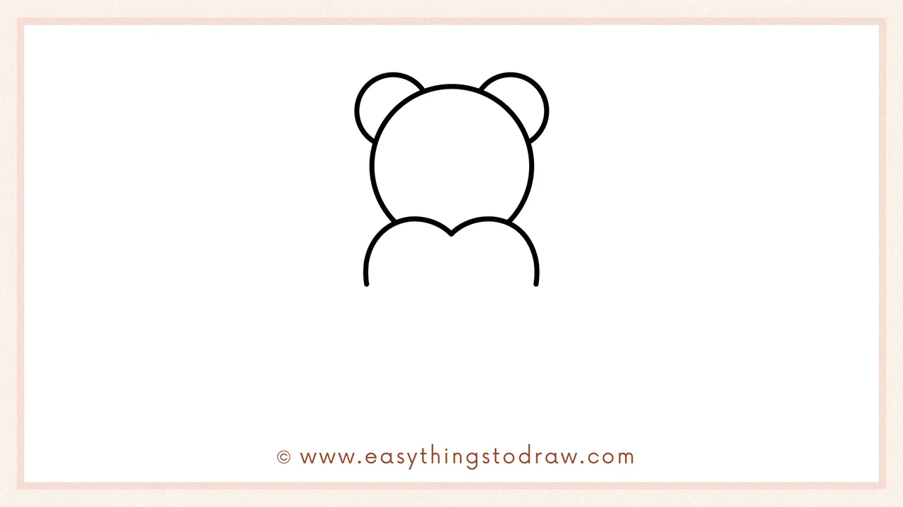 Step 2 of drawing a Valentine's Day Teddy Bear – Adding a large circle for the head and two smaller circles on the sides for ears.
