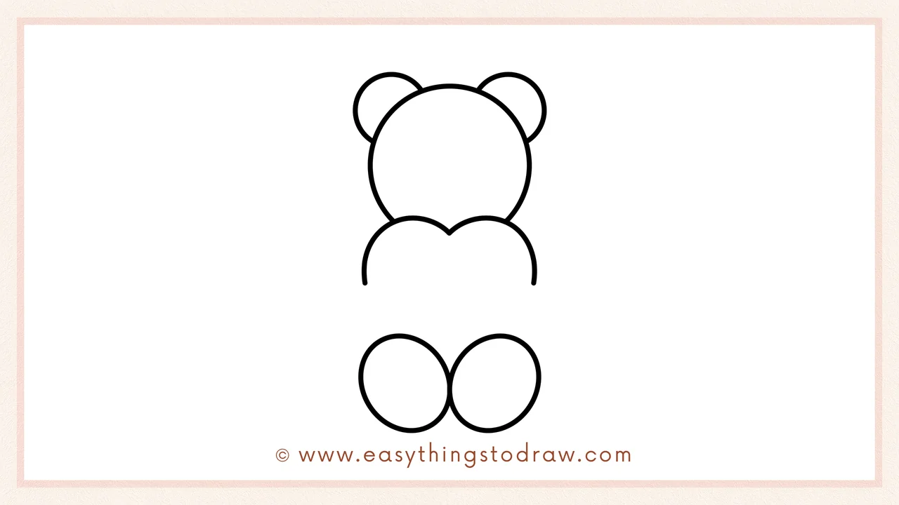 Step 3 of sketching a Valentine's Day Teddy Bear for beginners – Drawing a large heart shape for the body and two ovals below for the feet.