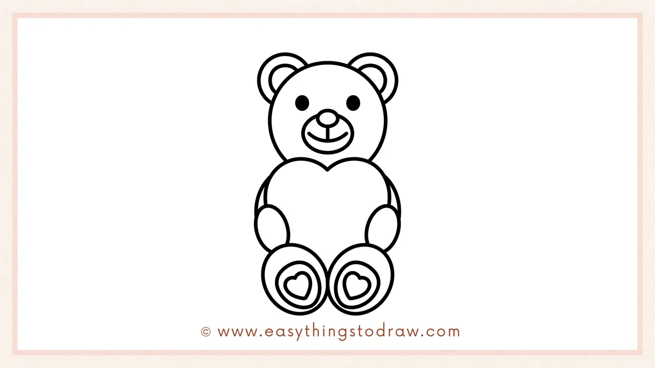 Step 6 of simple Valentine's Day Teddy Bear drawing tutorial – Adding a heart shape inside each foot to create cute paw pads.