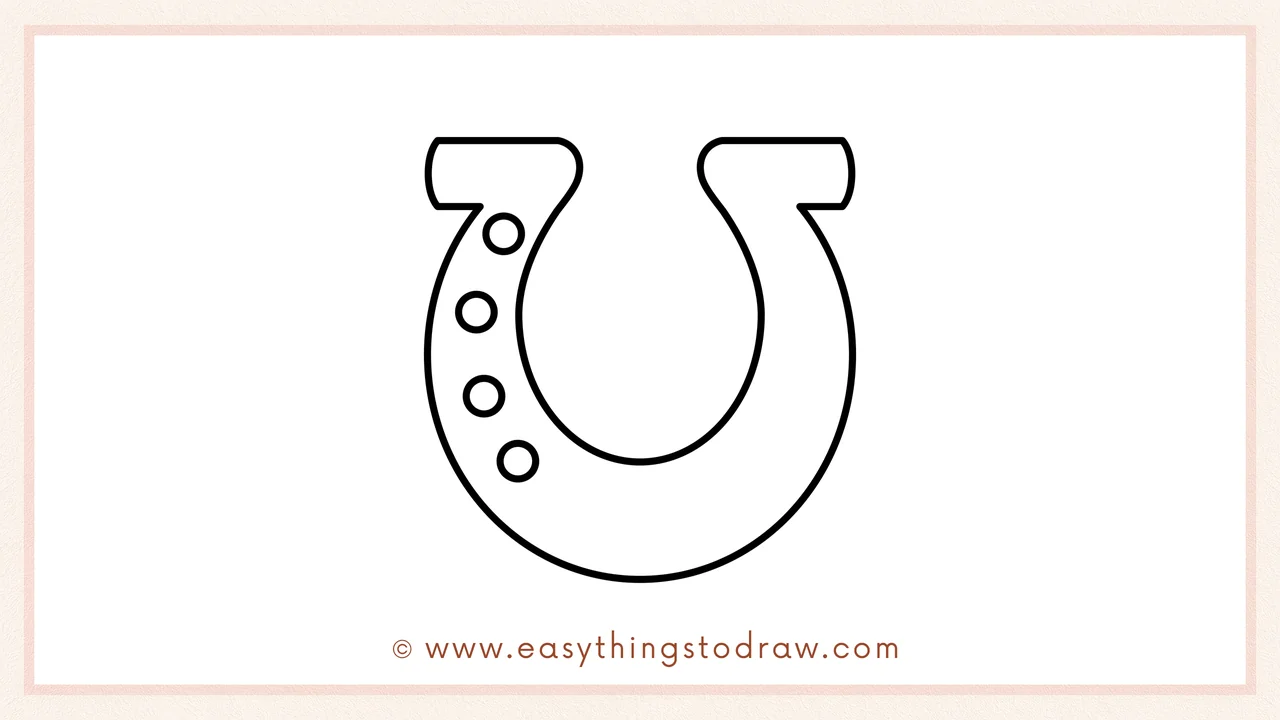 Step 4 of a step-by-step horseshoe sketch – Adding three small circles on the left side for the nail holes.