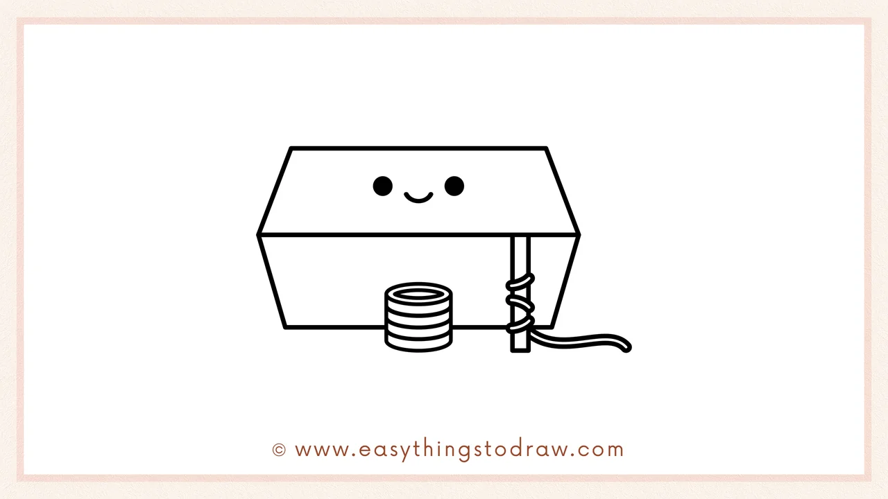 Step 6 of a simple leprechaun trap drawing tutorial – Draw two circle eyes and a smiling mouth on the front of the box.