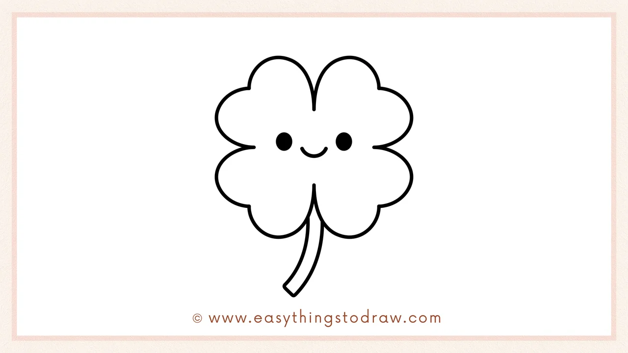 Step 6 of simple four-leaf clover drawing tutorial – Two dots for eyes and a small smile are drawn in the center for a happy face.