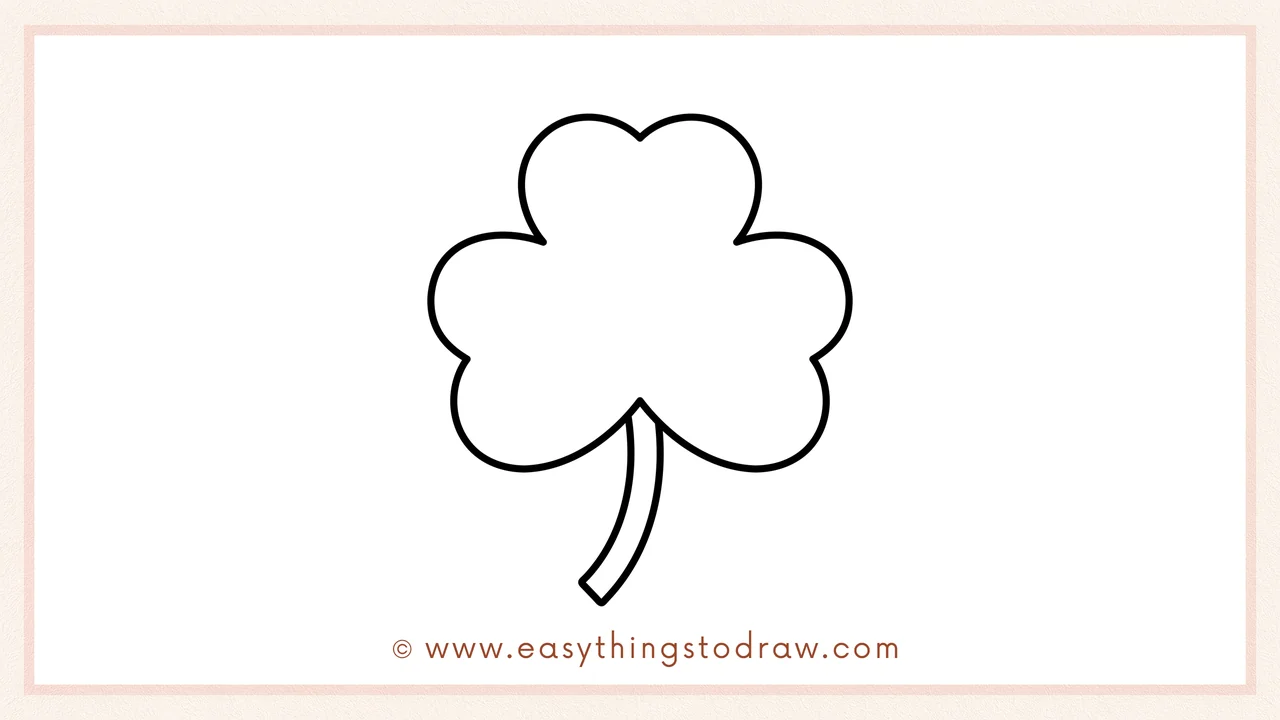 Step 5 of easy shamrock drawing steps – adding a second curved line to make the stem thicker.